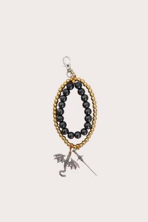 Aukso ir gun metal spalvos charm'as su drakonu | Novelle kolekcija